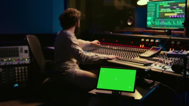 Sound Designer Processing Recording Tracks Control Room Using Mixing Console — Stock Video