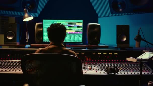 Professional Tracking Engineer Using Headphones Edit Recorded Tracks Control Room — Stock Video