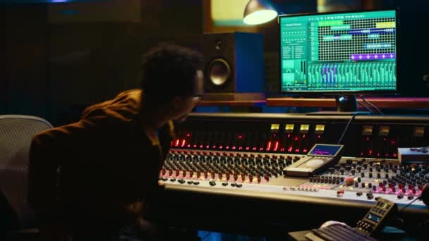 African American Audio Engineer Uses Compressor Mixer Professional Studio Changing — Stock Video
