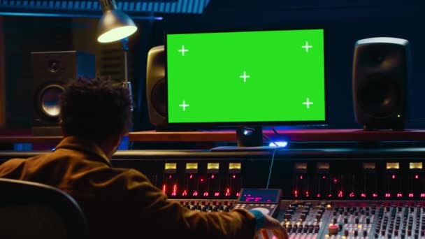 Audio Technician Works Music Post Production Greenscreen Control Room Pushing — Stock Video