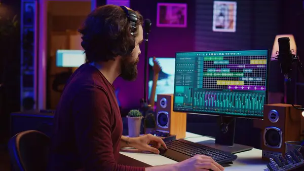 Music Composer Producing Soundtracks Using Stereo Panel Controls Soundboard Twisting — Stock Photo, Image
