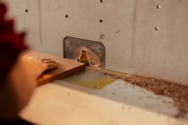 Man Workbench Putting Lumber Block Though Spindle Moulder Doing Furniture — Stock Photo, Image