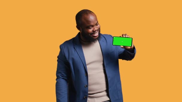 Portrait Man Doing Influencer Marketing Using Isolated Screen Phone Showing — Stock Video