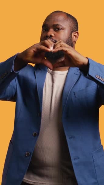Vertical Video Portrait Jolly Friendly African American Man Doing Heart — Stock Video
