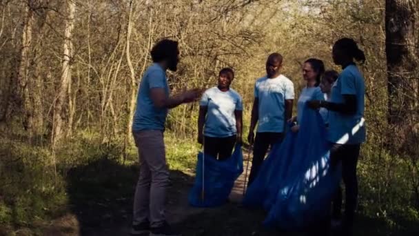 Team Activists Picking Plastic Waste Recycle Collect Rubbish Cleaning Forest — Stock Video