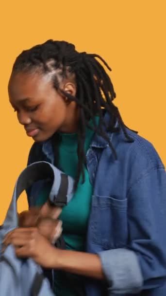 Vertical Video Joyous African American Woman Rummaging Backpack Looking School — Stock Video
