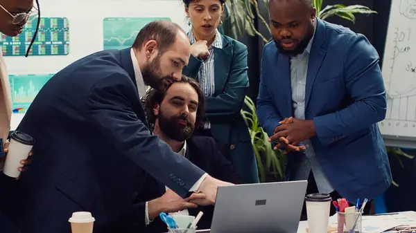 stock image Research team presenting all insight and statistics data they found online, briefing their manager about the work progress and achievements. Employees showing gathered info. Camera A.