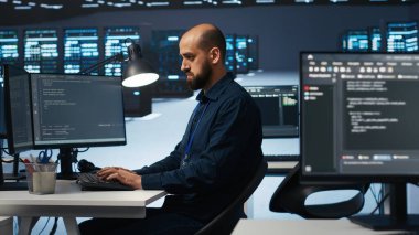 Computer scientist programming in high tech facility with server rows providing computing resources for different workloads. IT programmer overseeing supercomputers tasked with solving data operations clipart