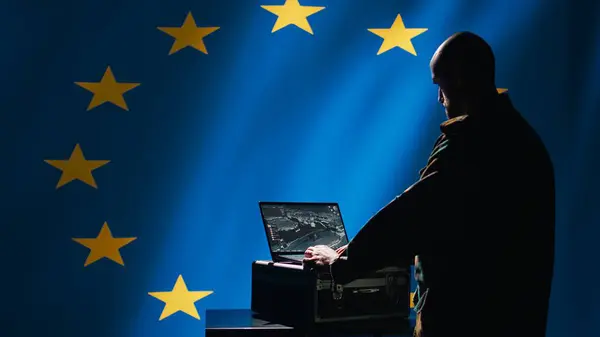 stock image European Union alliance soldier in control room uses military tech to identify threats. EU intelligence agency operator uses software to relay info to front lines, protecting member states, camera B