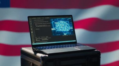 Amerikan İç Güvenlik Servisi 'nin terörizmi önlemek için kullandığı dizüstü bilgisayardaki yapay zeka yazılımı. Yapay zeka teknolojisi Vatanseverlik Yasası 'nın ABD düşmanları ve kamera A' ya karşı gözetleme prosedürlerini geliştiriyor.