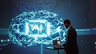 Sistem yöneticisi karmaşık problemleri çözmek için insan beyninden modellenmiş sinirsel ağlar kullanır. Yapay zeka kullanarak gelecekteki çalışma alanındaki yapay zeka araştırmacısı, kamera B
