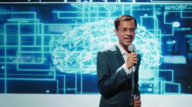 Teknoloji şirketinin CEO 'su zirveyi son yapay zeka ürünlerini piyasaya sürmek için kullanıyor. Menajer mikrofonu iş dünyasının liderleri ve yatırımcılarıyla görüşmek için kullanıyor. Yapay zeka, kamera B