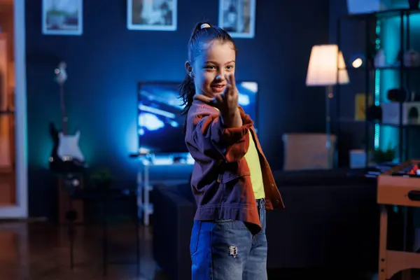 stock image Kid doing content creation for children, utilizing high quality recording equipment to produce dance videos for online streaming platforms. Young media sensation creating trending choreography