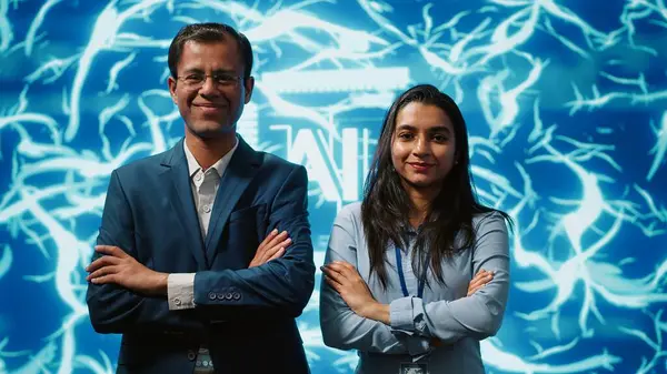 stock image Portrait of smiling team of technicians implementing artificial intelligence parallel processing, breaking up complex computational tasks enabling AI systems to process data faster, camera A