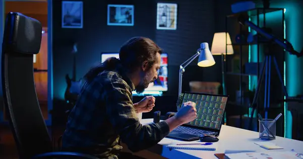 stock image Annoyed broker investor in home office bothered by low stock exchange valuation, screaming after losing money. Angry man yelling and doing facepalm after seeing market shares plummeting, camera B