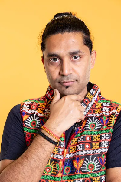 stock image Portrait of pensive man deep in thoughts, doing reasoning hand gesturing, isolated over studio background. Close up shot of confused person doing stroking chin gesture, thinking, studio backdrop