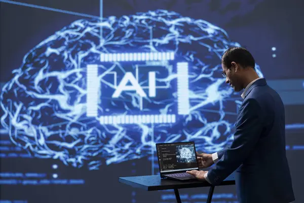 stock image Computer scientist analyzing complex AI brain models on laptop. IT professional using machine learning software on notebook device to develop artificial intelligence technology