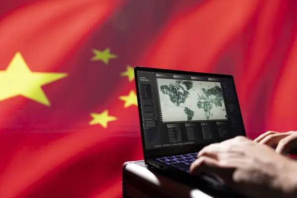 stock image Chinese army conducts tactical reconnaissance, utilizing laptop for data analysis and mission planning, close up. CCP government military agent looks at aerial map on screen, pinpointing targets