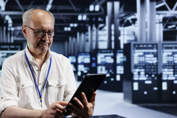 stock image Adept worker in data center providing dedicated VPN servers able to deliver advanced privacy, encrypted sensitive data, online anonymity and secure internet connections to users