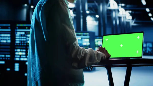 stock image Asian employee using isolated screen laptop to implement artificial intelligence parallel processing. Professional works on chroma key device enabling AI systems to do machine learning inference