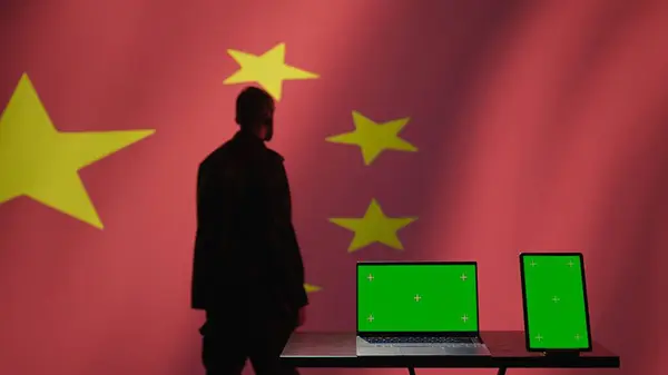 stock image Chinese air defense division personnel monitors incoming enemy aerial attacks with green screen devices. China secret service maintains air space superiority with chroma key radar equipment, camera B