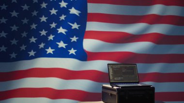 Laptop in CIA command center used by counterterrorism agents to run surveillance efforts against enemy of United States in conformity with Patriot Act law, isolated over USA flag, camera B clipart