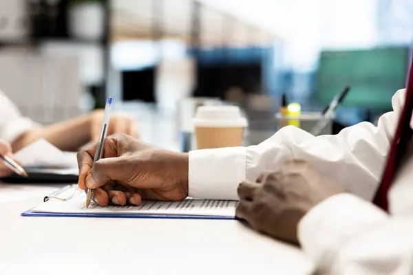 stock image Recruiter signing contract after finding best talent to fill open company position. Close up of human resources employer hired to assess skills of candidate, filling paperwork