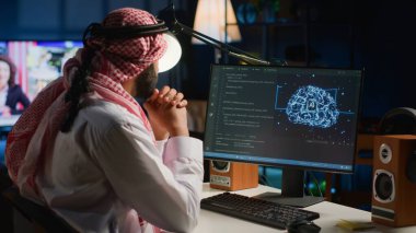 Arab admin using computer to visualize artificial intelligence neural networks made up of interconnected nodes using augmented reality technology. Developer oversees AI systems processing information clipart