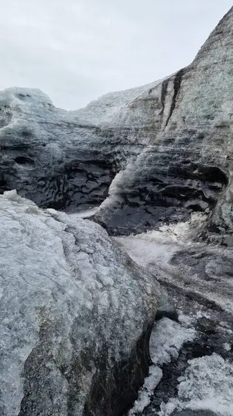 stock image Inside of vatnajokull glacier ice caves with cracked structure of ice blocks, icelandic nordic landscape. Massive transparent iceberg in wintry weather, cold iceland nature.