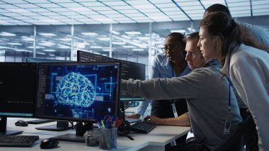 Mühendis, yapay zeka iş yükleri için kullanılan sunucu odasını kontrol ederken kod hatası bulduktan sonra meslektaşlarını arıyor. Veritabanı sistemlerinde hata bulunduktan sonra iş arkadaşlarından yardım isteyen adam, kamera B