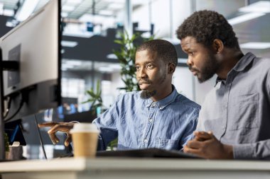 Financial advisor and colleague discussing resource allocations and budget planning in a corporate meeting, strategizing ways to optimize resources and achieve organizational goals. clipart