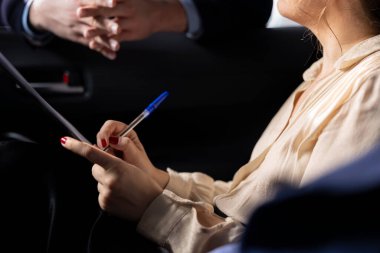 Woman signing deal contract after finishing test drive in car dealership. Close up of buyer writing signature on paperwork with pen, buying extra vehicle features at showroom agent suggestion clipart