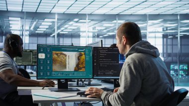 Engineer in server hub making generative artificial intelligence website generating videos using diffusion model algorithms. Employee coding AI virtual assistant producing clips, camera B clipart