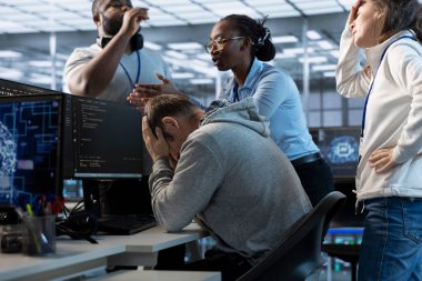 Employees berating engineer in office after mistake leading to errors in high tech AI data center. IT workers scolding admin in server farm after damaging artificial intelligence supercomputers clipart