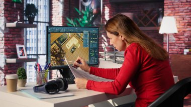 Yaratıcı ofisteki uzaktan çalışan CAD yazılım ve plan kullanır, bir evin içini tasarlar ve sanal ev özelleştirmesi için bir kullanıcı arayüzü sağlar. Ayrıntılı mimari düzen. Kamera B.