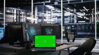 Veri merkezindeki izole ekran laptopu ve bilgisayar sunucu altyapısını denetliyor ve yapay zekaya güç veriyor. Donanım yapılandırmalarını izlemek için kullanılan Mockup defteri