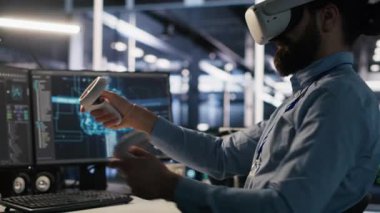 Veri merkezi geliştiricisi sanal gerçeklik teknolojisini kullanarak yapay zeka LLM sinir ağlarını görselleştiriyor. AI sistemlerini denetlemek için VR kulaklık kullanan sunucu çiftliği bilişim uzmanı, kamera A