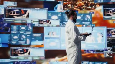 Genç sıhhiyeci, teletıp için sanal sağlık teknolojisi, bağlı sistemler ve küresel sağlık çözümleri sunmada akıllı tanılar ile etkileşim halindedir. Biyoteknoloji geliştirme. Kamera B.