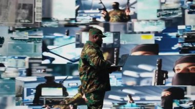 Savunma Kuvvetleri subayı gözetim ve dijital sistemleri inceler, savaş stratejileri ve savaş alanı detaylarıyla savaşa hazırlanır. Askeri kontrol merkezinde savaş planlama operasyonları. Kamera A.