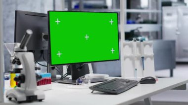 Moleküler analiz ve farmakoloji için gelişmiş laboratuvar ekipmanlarıyla boş bir araştırma tesisinde çalışan bir monitör görüntüsü. Biyolojik bilimler, keşfi ve bilimsel kesinliği yansıtır.