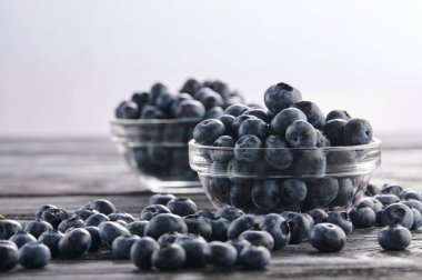 fresh blueberries in bowls on the table