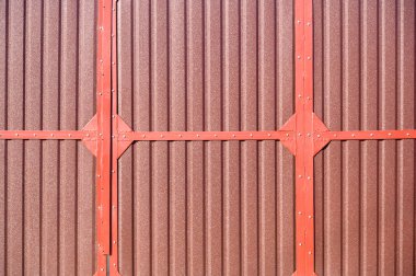 Kahverengi demir kapı, yakın plan metal kapı çiti.