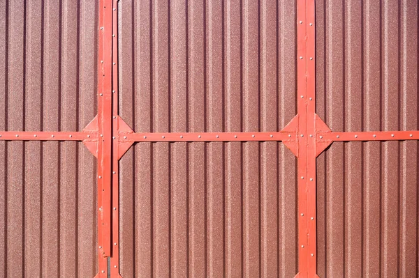 brown iron gate, close-up shot of a metal gate fence