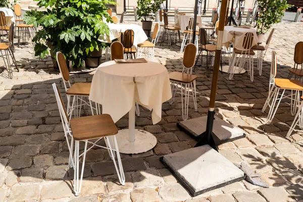 tables and chairs, outdoor furniture for restaurants on a sunny day