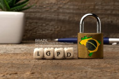 LGPD (brazilian data protection law) concept: lock with brazil flag and some die with the acronym of the Brazilian data protection law (Lei Geral de Protecao de Dados Pessoais) clipart