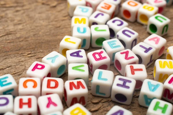 Set Dice Colorful Letters Wooden Table Shallow Depth Field — Stock Photo, Image