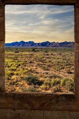 South Australia, view of the Flinders Ranges from a old brick window clipart