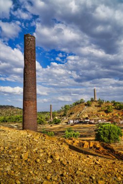 Ruins of the smelters at Chillagoe, Queensland, Australia with remaining brick chimneys. clipart