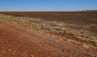 Dry arid region in the outback the Barkly Highway national highway in Northern Territory and Queensland a dry arid region in the outback clipart