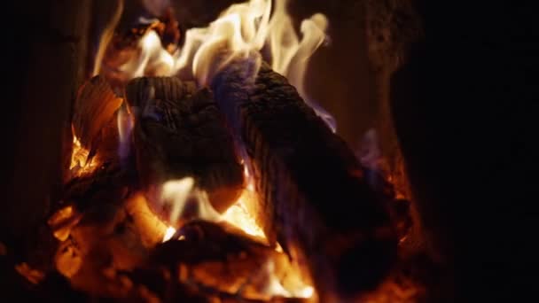 Throwing Firewood Old Rustic Stove Keep Fire Going — Vídeo de stock
